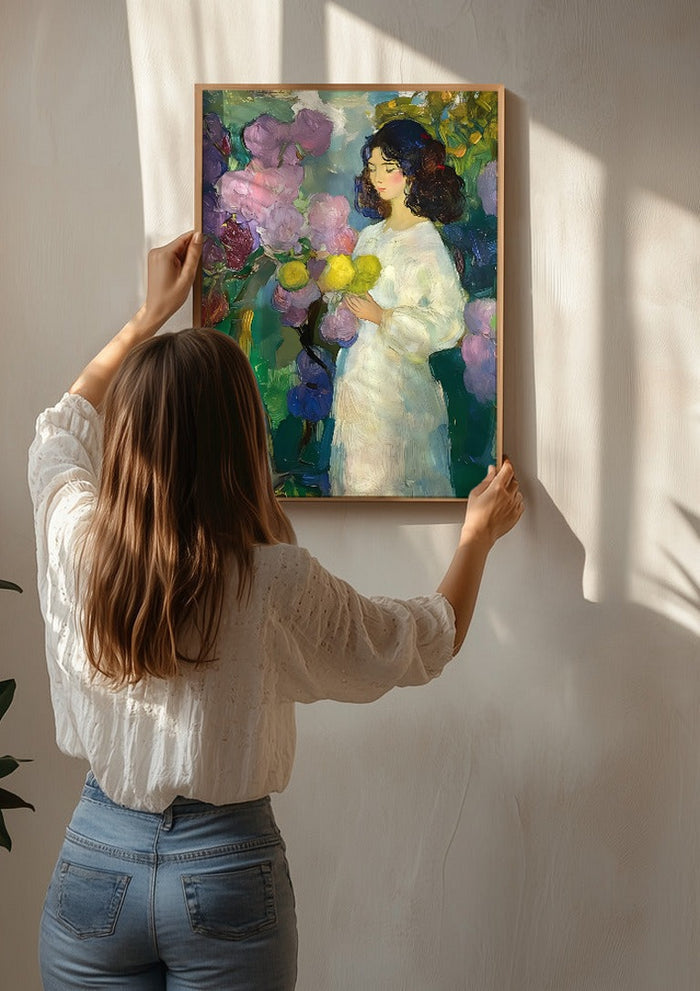 Girl with Yellow Flowers by Elena Avanesova being hung on a sunlit wall