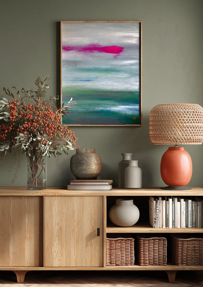 Scarlet sunset 2 by Marina Agre above a wooden sideboard on a sage green wall